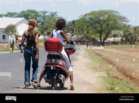 Young Girls Riding Scooter Hell Ville Andoany Nosy Be Island Republic Of Madagascar Indian