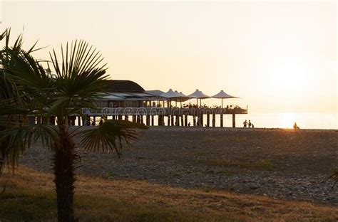 View of the Restaurant on the Beach and the Sunset on the Sea. Stock ...