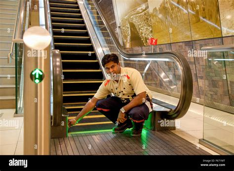 Maintenance Man Fixing Escalator Dubai Metro Stock Photo Alamy