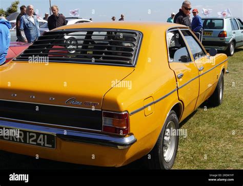 Classic Yellow Ford Cortina Mark 3 Parked On Seafront Promenade For Car