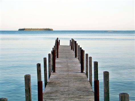 Premium Photo Wooden Jetty In Sea