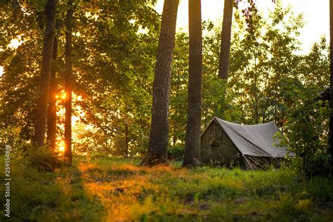 Camping on the beach during the sunset or sunrise. Bright sunlight ...