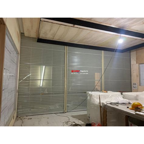 Pemasangan Rolling Door One Sheet Full Perforated Di OPPO Trans Studio