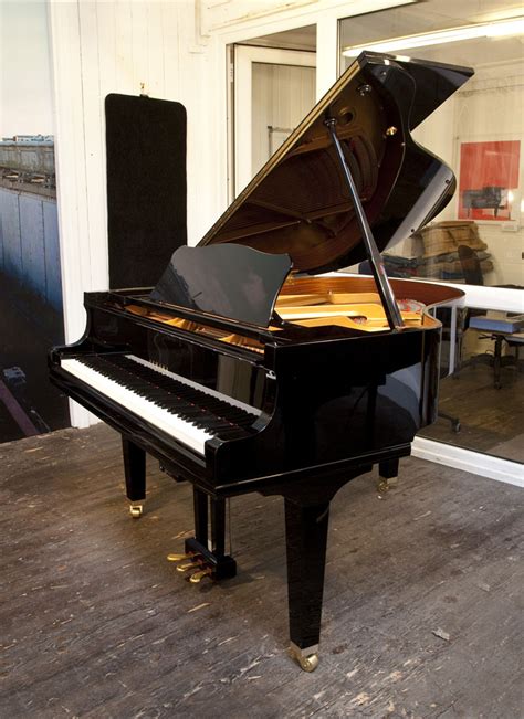 Yamaha Gc Baby Grand Piano For Sale With A Black Case And Square