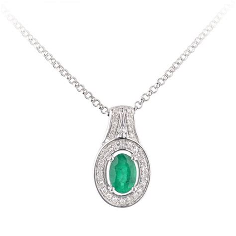 SPARKLD 18ct White Gold Oval Emerald And 0 08ct Diamond Cluster Pendant