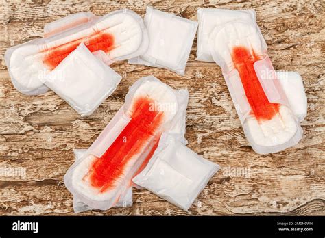 Pile Of Used Sanitary Pads With Blood Menstruation And Feminine