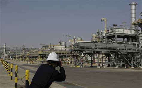 File A Photographer Takes Pictures Of The Khurais Oil Field During A