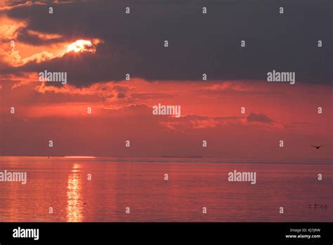 Sunset Over The Wash Hunstanton Norfolk Uk Stock Photo Alamy