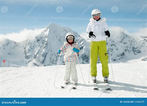 Family skiing stock image. Image of girl, goggles, helmet - 16236189