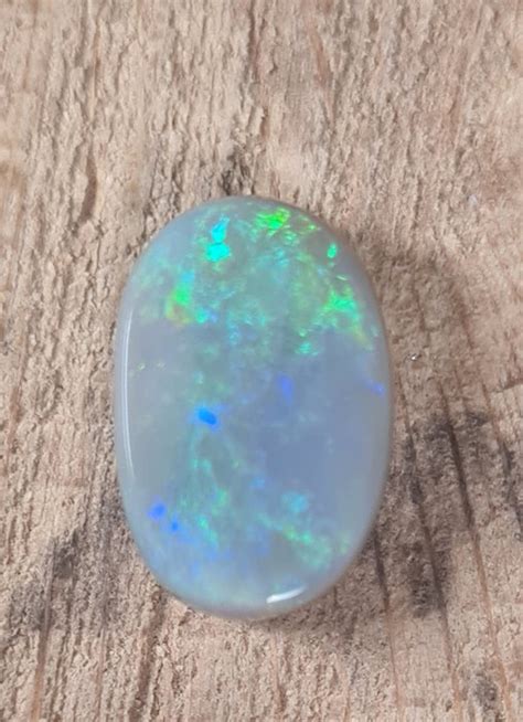 Grey Play Of Colors Opal 5 04 Ct Catawiki