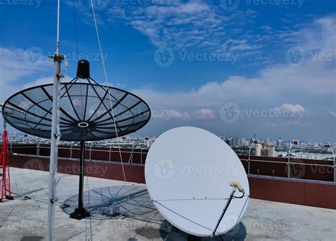 A Satellite Dish Is Installed On The Roof Of A Machine Room On The Top