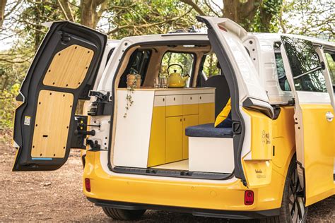 vw id buzz electric camper bus bursts  color  sustainability