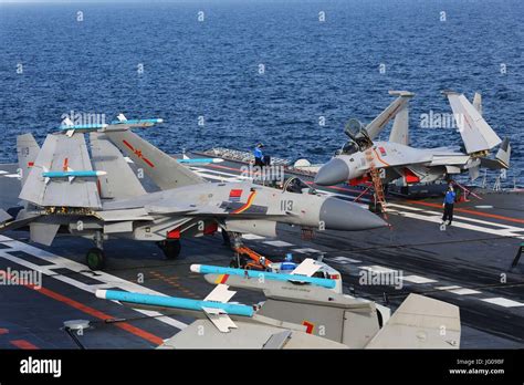 Aboard Liaoning Aircraft Carrier. 1st July, 2017. A carrier-borne J-15 ...