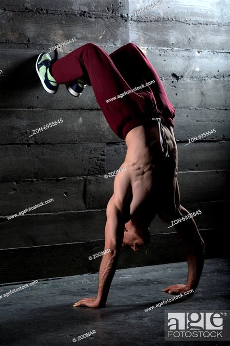 Athlete With Naked Torso Doing Push Ups On His Hands While Stand Stock Photo Picture And