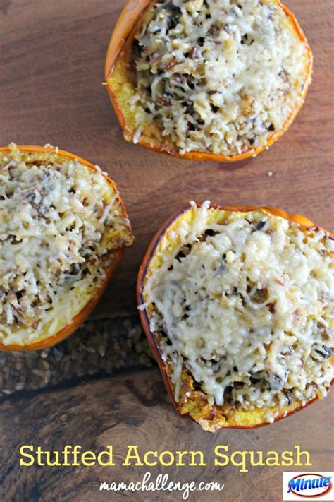 Three Stuffed Acorn Squash On A Wooden Table With Text Overlay That