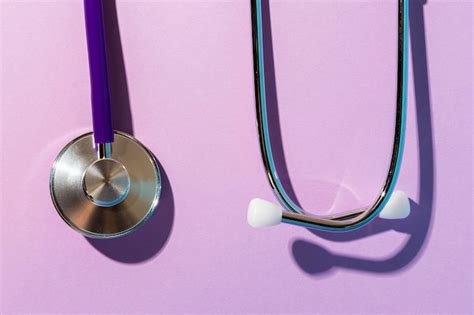 Top View Stethoscope On Purple Background Free Photo