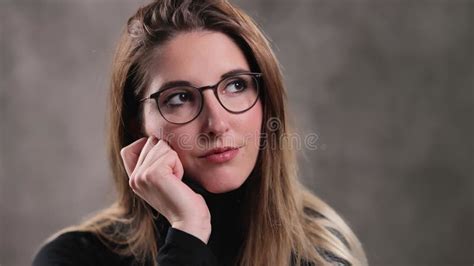 Close Up Of A Blonde Girl With A Beautiful Face Posing For The Camera