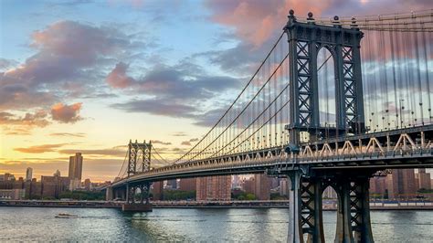 manhattan bridge  east river  sunset  york city usa
