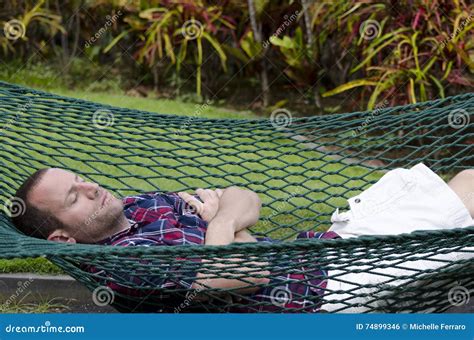 Man Relaxing In Hammock Stock Photo Image Of Arms Laying 74899346