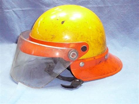 Vintage Firefighter Helmet - Authentic and Collectible