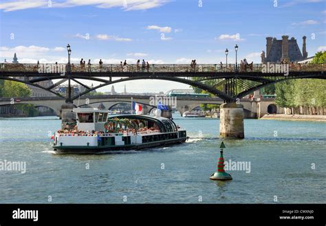 The Pont des Arts or Passerelle des Arts, bridge across river Seine in ...