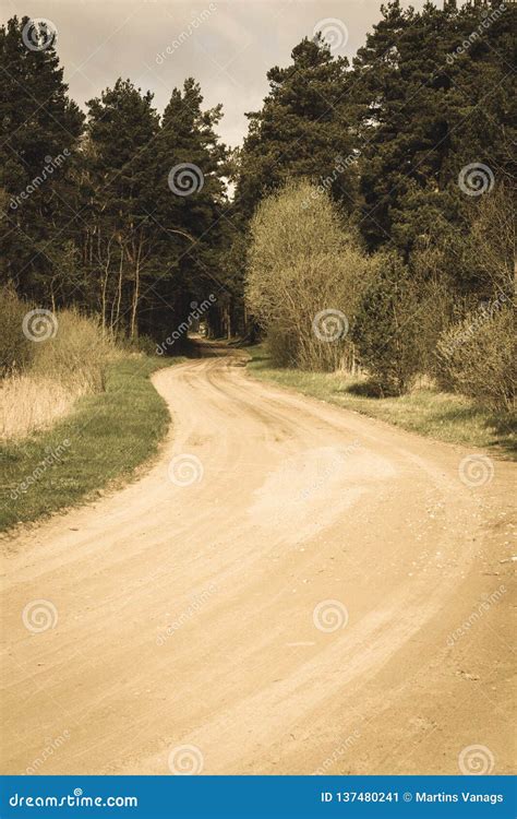 Country Gravel Road With Old And Broken Asphalt Vintage Retro Look