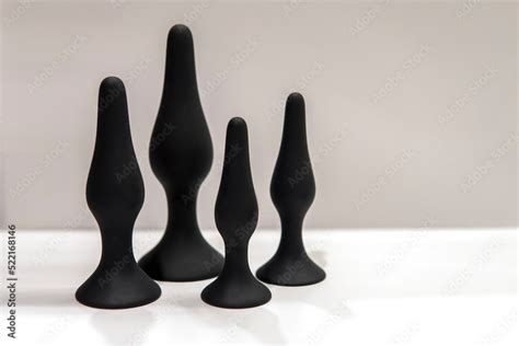 Four Black Silicone Butt Plugs On The White Background Sex Toys Set Stock Photo Adobe Stock