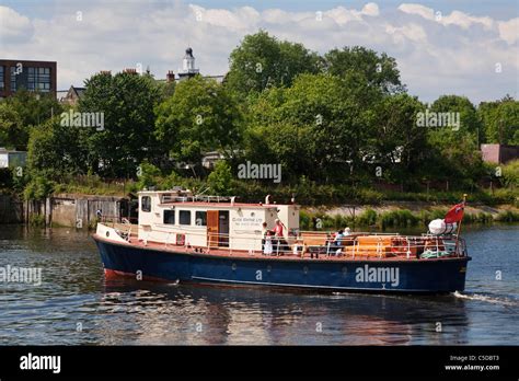 The Govan ferry taking passengers across the River Clyde, Glasgow ...