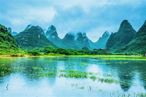 Karst rural scenery in raining Photograph by Carl Ning