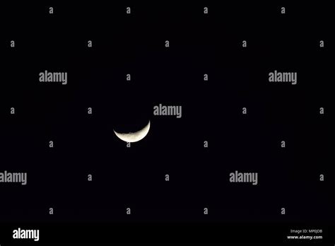 Nature Background Of Shining Half Moon In Dark Night Sky Stock Photo