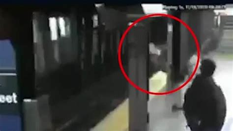 Watch Shocking Moment Woman Pushed In Front Of NYC Subway Train