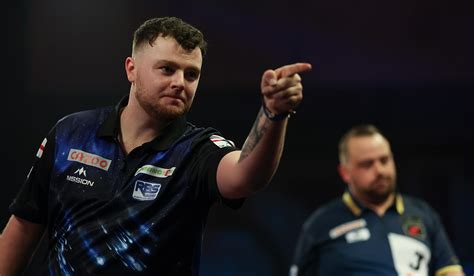 Josh Rock wins with style in World Darts Championship debut