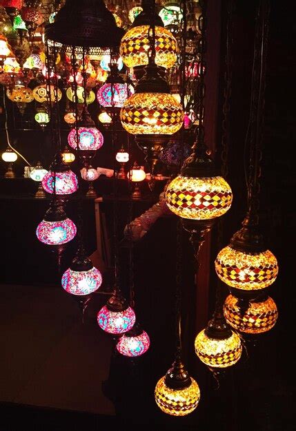 Premium Photo | Illuminated lanterns for sale in store at night