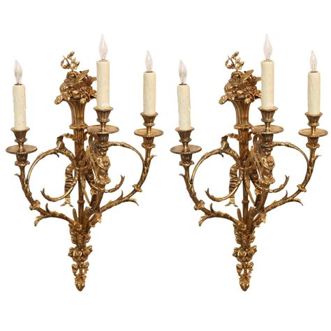 Pair Of 19th Century French Neoclassic Gilt Bronze Sconces Three