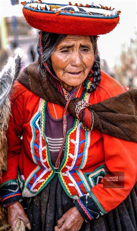 A Local Woman Dressed In Traditional Clothing In Cusco Peru South