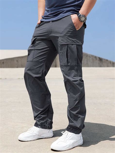 Manfinity Homme Loose Fit Men S Cargo Pants With Flap Pockets And Side