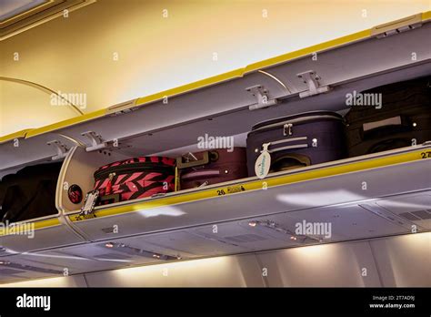 Overhead Luggage Compartments On Ryan Air Flight Stock Photo Alamy