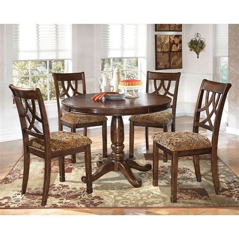 The Rich Elegant Design Of The Leahlyn Dining Room Set By Signature