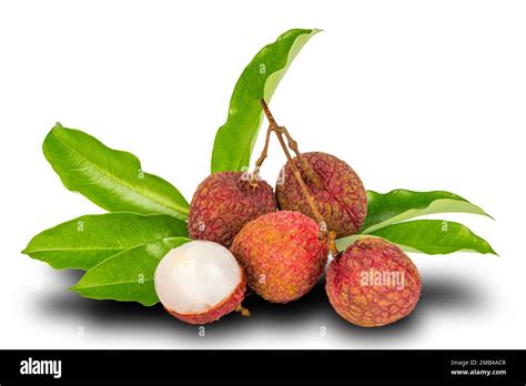 Bunch Of Ripe Lychee And A Half With Green Leaves Isolated On White