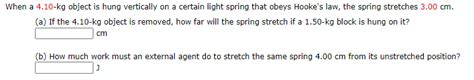 Solved When a 4.10-kg object is hung vertically on a certain | Chegg.com