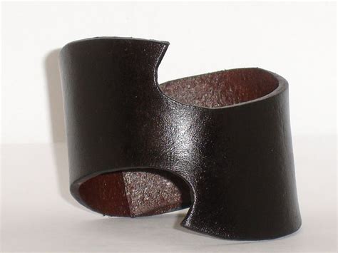 Dark Brown Leather Cuff Bracelet - Swoosh Design, via Etsy. Leather ...