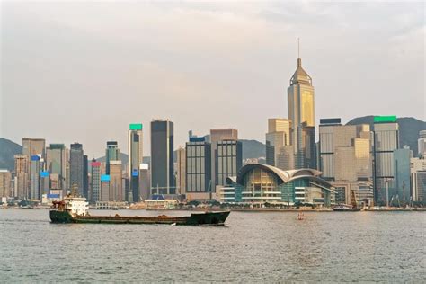 Premium Photo Dry Cargo Vessel And Victoria Harbor In Hong Kong At