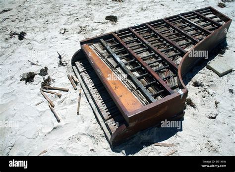 Piano washed up on beach Stock Photo - Alamy