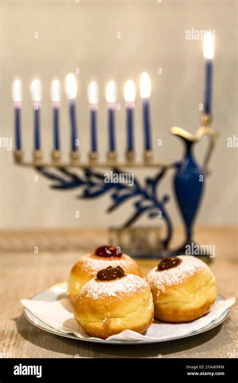 Menorah With Lit Burning Candles For Jewish Hanukkah Holiday On Table