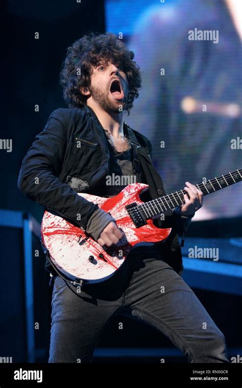 Fall Out Boy guitarist Joe Trohman is shown soloing during a "live
