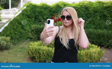 Blonde Woman Taking Selfies In The Park Video Stock Footage Video Of Nature Beautiful 286109572