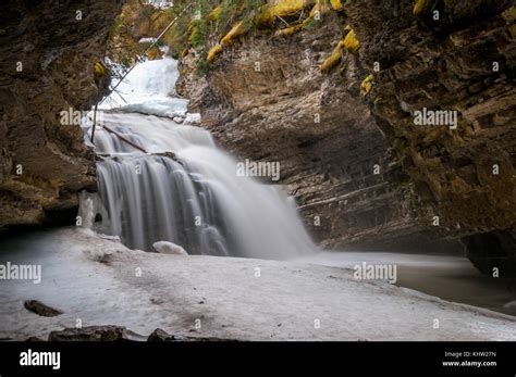 Hidden Falls and Cave in Johnston Canyon Stock Photo - Alamy