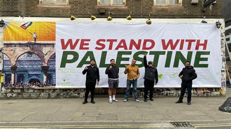 London councillor unveils Palestine solidarity banner in Brick Lane