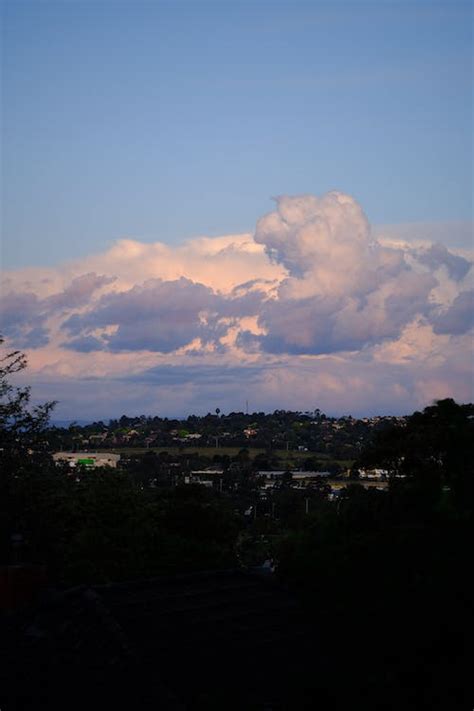 Town under a Pink Sunset Sky · Free Stock Photo