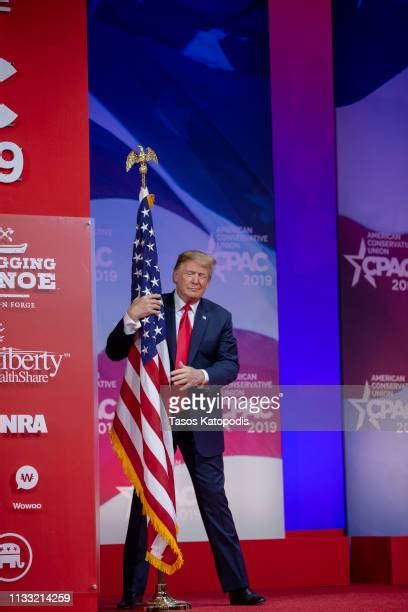 Trump Hugging Flag Photos and Premium High Res Pictures - Getty Images